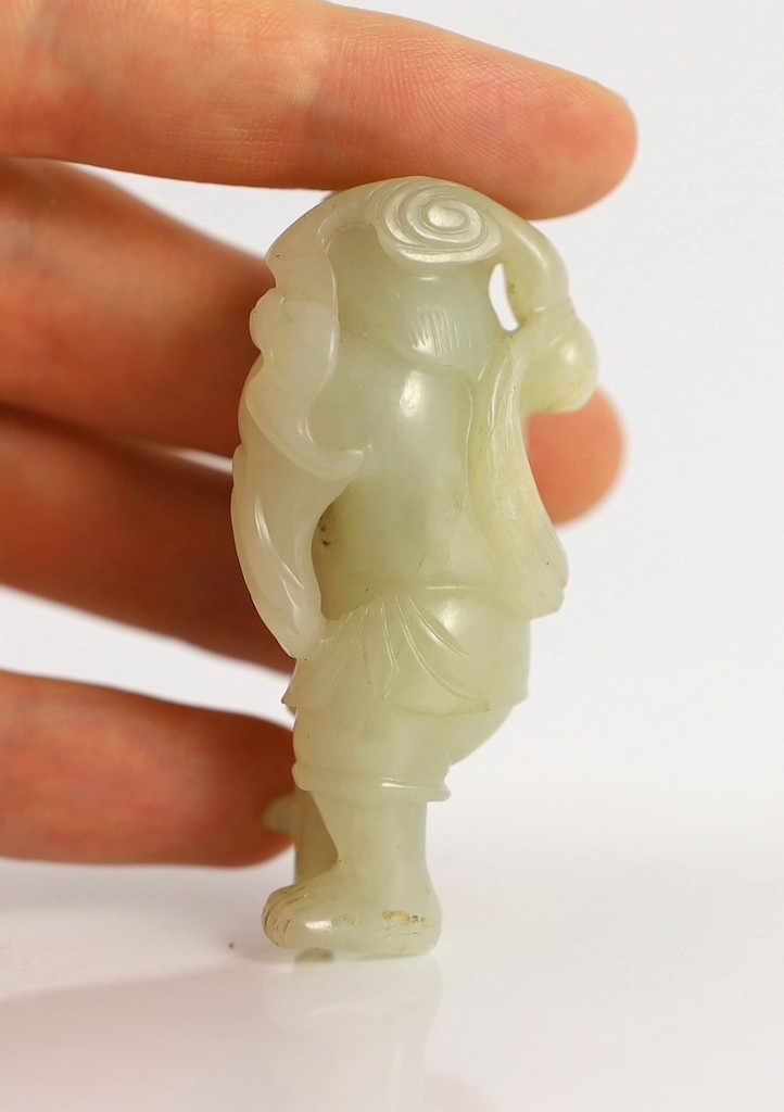 An assembled group of four Chinese pale celadon jade figures, 18th/19th century, displayed on two later wood 'rock-work' stands, total height approximately 19cm high